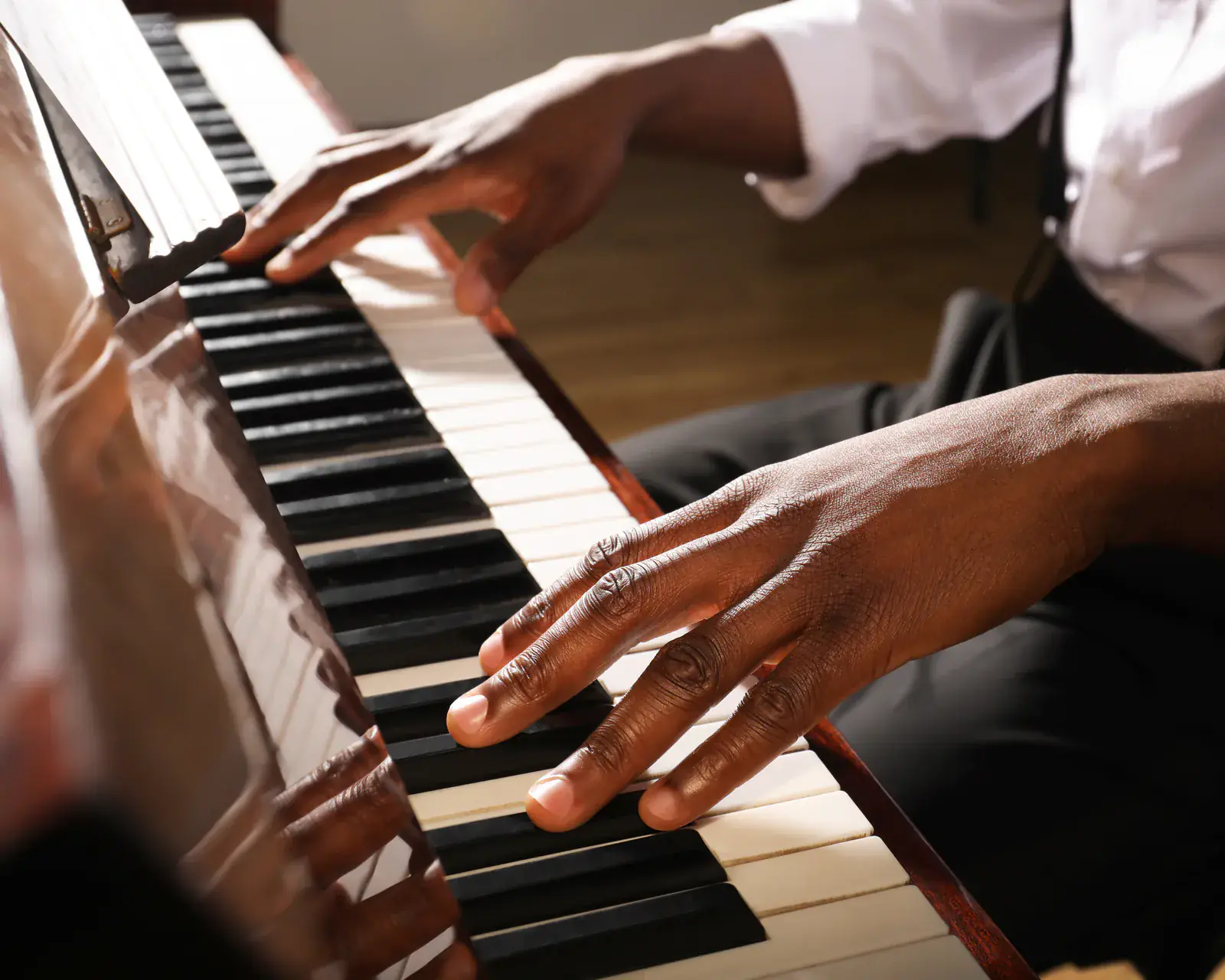 Hands playing piano keys — piano and keyboard programme at Concerto Music Place